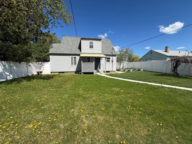 Building Photo - Ideally Located and Updated 4 Bed 2 Bath Fully-Fenced Home w/ Detached Garage/Shop!