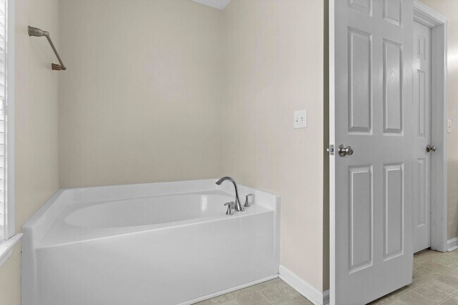 Building Photo - House with Fenced Back Yard Available!