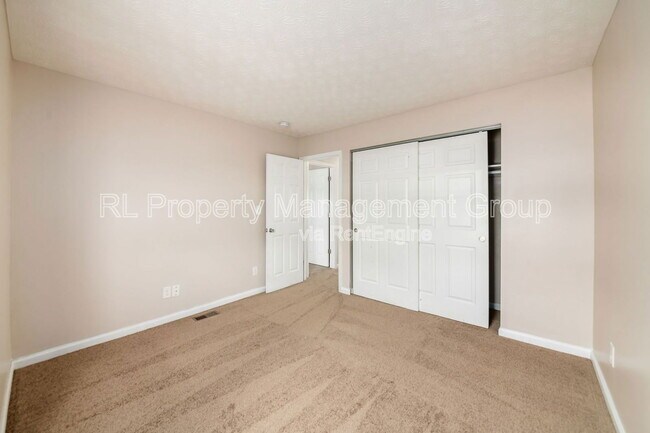 Building Photo - 7179 Feather Ct
