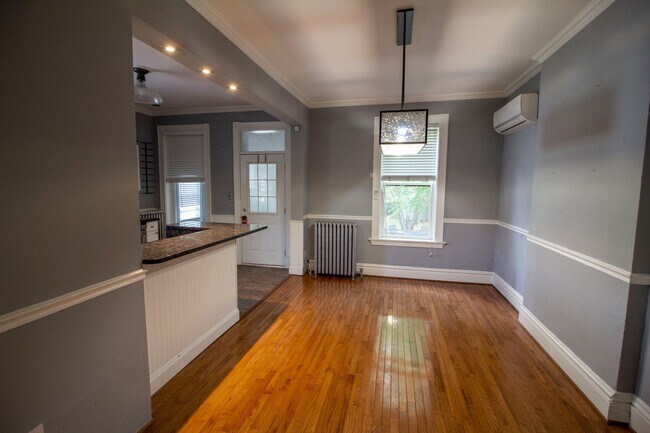 Building Photo - 2 bed/1 bath, Single-family Home! Modern and spacious with off-street parking and a relaxing back...