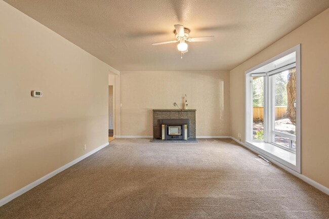 Building Photo - Charming, retro 2-bdrm/2-bath ranch in tranquil setting w/ large family room
