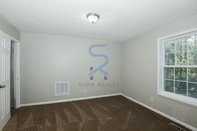 Building Photo - Move in before January 15th and choose your reward: a $250 Amazon Gift Card or a 55 Smart TV!