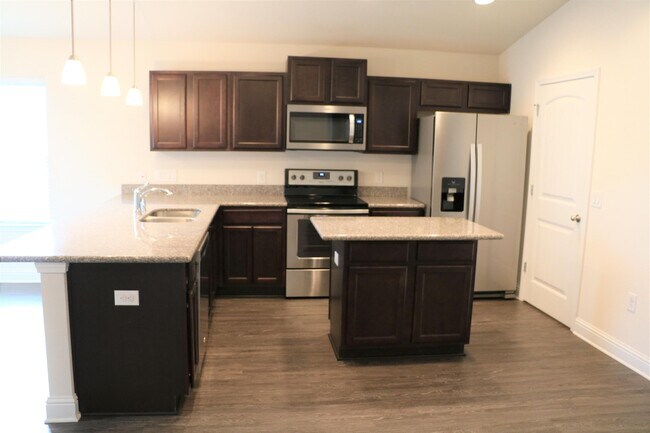 Building Photo - 6393 Redberry Dr
