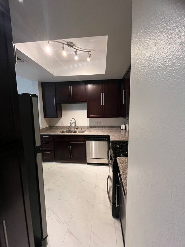 Building Photo - Meridian  Fully FURNISHED Condo with Strip...