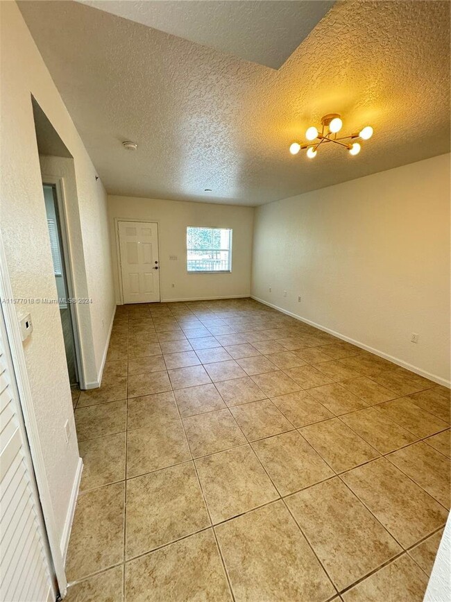 Building Photo - Riverside Drive, Coral Springs, FL 33065 -...