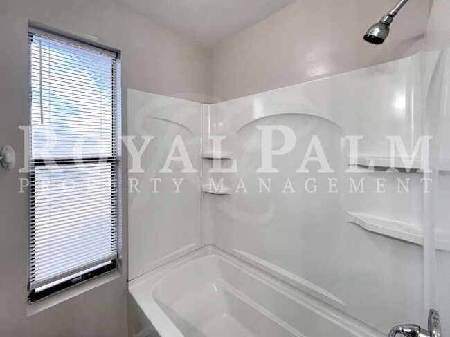 Building Photo - 2/1 Rental with W/D Hookups—Roses are Red, Lawns are Green, a Fenced Yard? That’s a Pet Lover’s D...