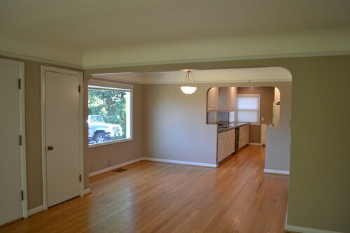 Large windows and hardwood throughout. - 9121 SW 35th Ave