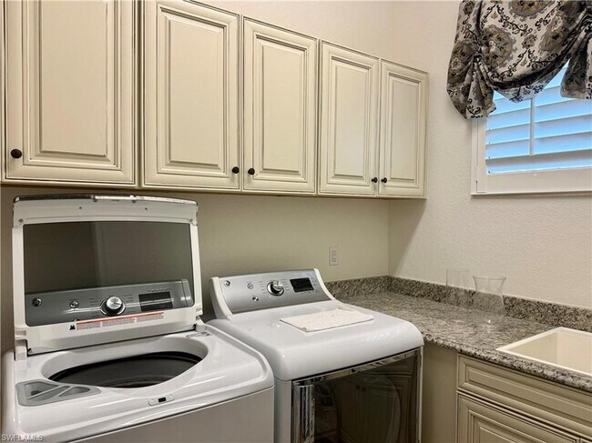 Building Photo - 9923 Corso Bello Dr
