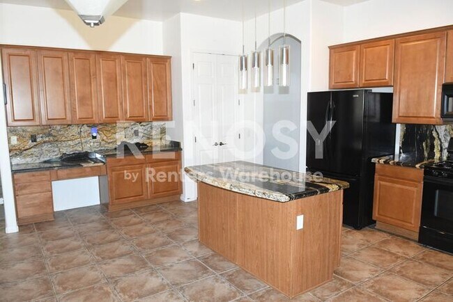 Building Photo - 4 BD + Office, 2.5 BA. 3-Car Garage w/ Pool in Litchfield Park!