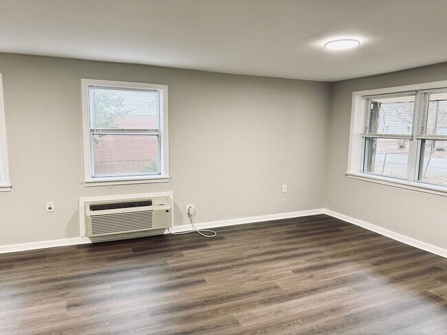 Building Photo - **NEW PRICE** All Utilities Included Plus Washer and Dryer!**