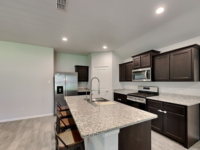 Building Photo - Chapel Creek Beauty with Designer Kitchen, Spacious Layout & Private Backyard Retreat!