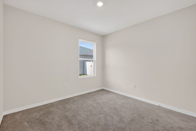 Building Photo - Available Now in Tavares | 2023 Built 4BR/2BA Home with 2-Car Garage