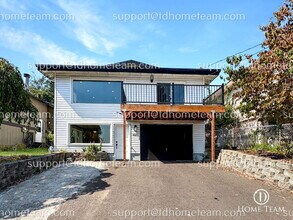 Building Photo - "Charming 4-Bedroom Home with Scenic Views & Finished Basement in Renton!"