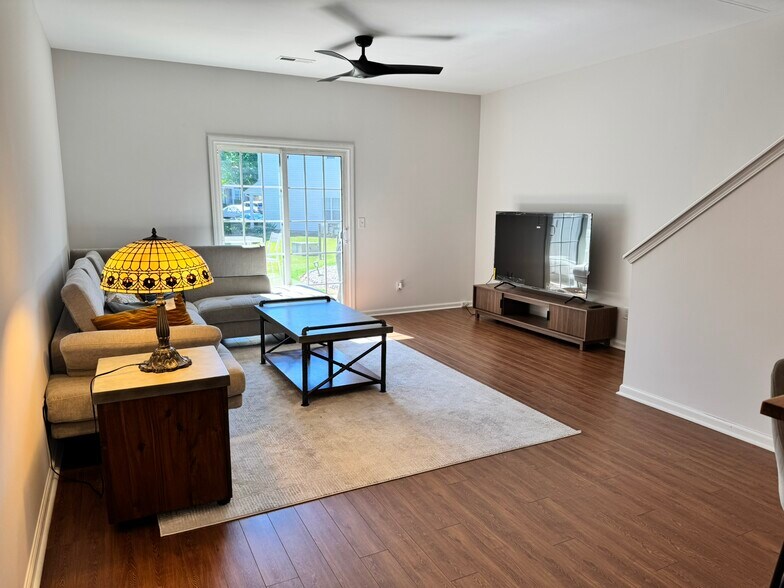 Living Room New 65" TV - 612 Graythorn Ln