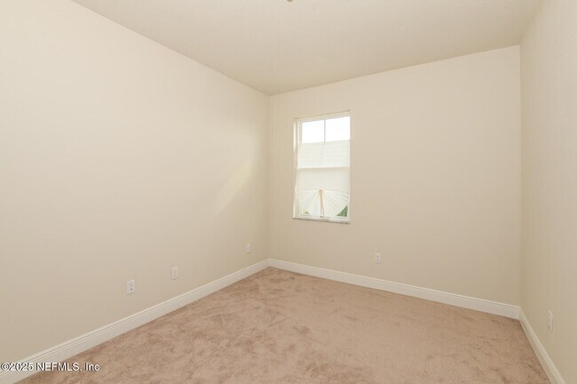 Building Photo - 10976 SW Tessili Wy