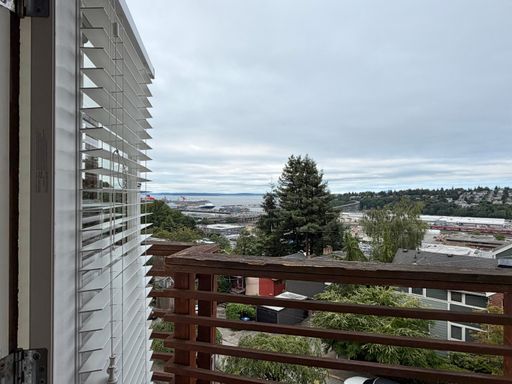 Building Photo - Industrial-Style Queen Anne Townhome with water views on every floor! AVAILABLE NOW!