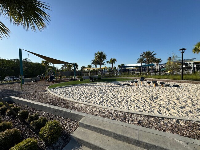 Building Photo - Elegant living in a vibrant, strategically located community—your perfect place to call home.