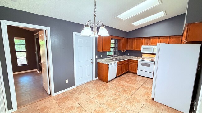 Building Photo - $500 OFF A MONTHS OF RENT IF YOU APPLY BEFORE MAY 12TH. Pet-Friendly 3BR Home with Spacious Yard ...