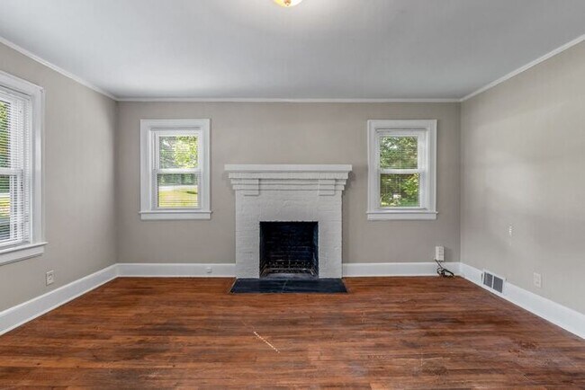 Building Photo - Adorable Home, Just Painted, Wood Flooring...