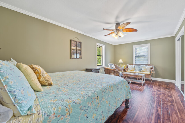 Master bedroom features a King-sized bed and 1 Queen-sized pull-out couch - 1090 Quail Trl