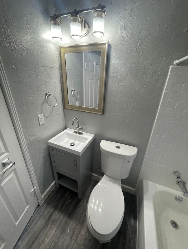 Building Photo - OPEN HOUSE! Remodeled Two Bedroom, End Unit with A/C and Large Fenced Yard