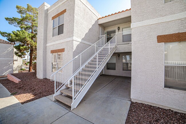 Building Photo - Cozy second floor condo located in gated c...