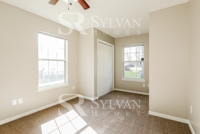 Building Photo - The living is easy in this 4 bedroom, 2 bathroom home