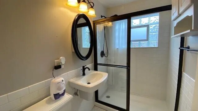 Bathroom Is Done In White Subway Tile & Vintage Mini Hexagon Tile Flooring W/ Oil Rubbed Bronze Acc. - 2 N Broadway Ave