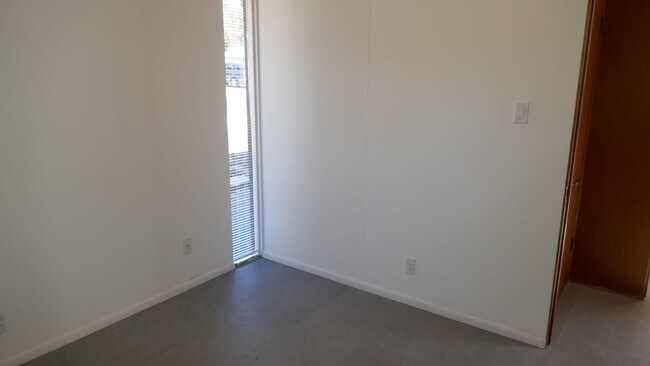 Building Photo - BEAUTIFUL UPDATED FOUR BED / TWO BATH PLUS OFFICE EICHLER HOME WITH GREAT OUTDOOR SPACE