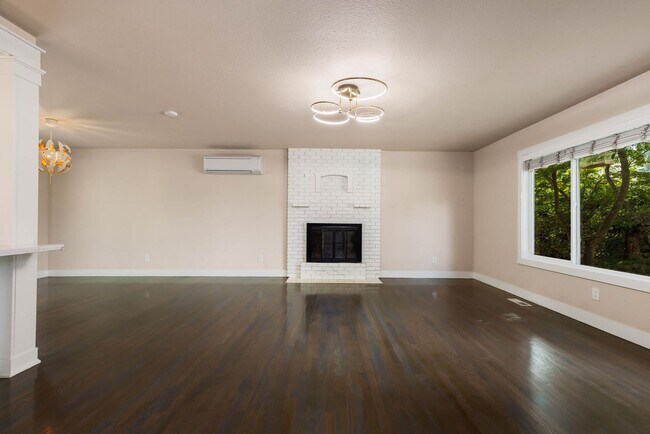 Building Photo - Updated Split-Level Home with Flexible Living Spaces & Backyard Deck