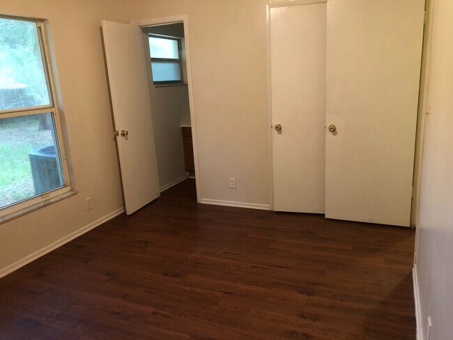 Building Photo - SPACIOUS 3BR/1.5BA w/Carport, Beautiful Wood Finish Flooring, Privacy Fenced Backyard! NO APP FEE!