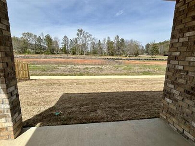 Building Photo - Relax & Unwind in This Peaceful 4 Bedroom ...