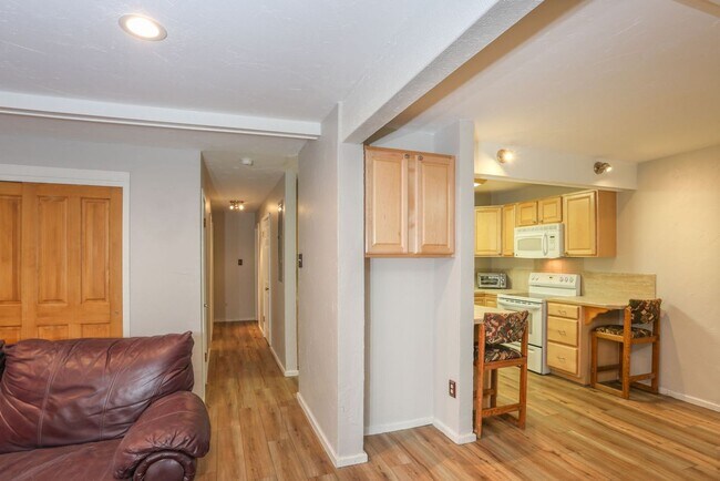 Building Photo - Walk to everything! Partially Furnished! Flexible lease terms!