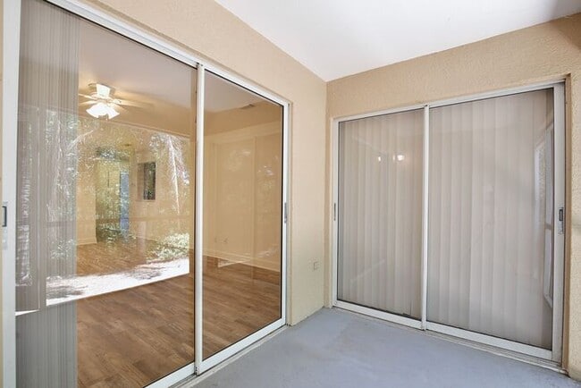 Building Photo - Spacious 3/2 Condo with a Cover Patio Area...