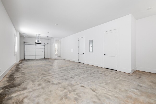 Building Photo - Brand New Modern City Townhome  | Downtown...