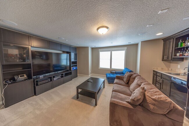 Building Photo - Four Bedroom Home + Bonus & Den in Gated C...