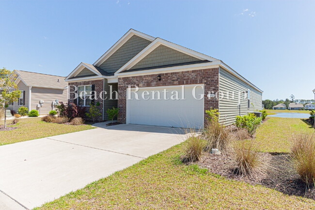 Building Photo - Spacious 4 Bedroom with Pond View