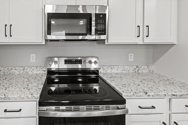 Building Photo - Experience Elevated Living – Come tour our...