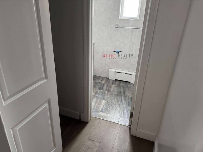 Building Photo - 21-44-44 71st St