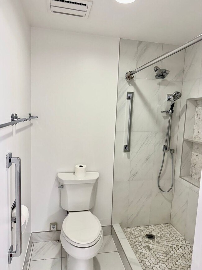 Building Photo - Experience Luxury and Prestige at Yorktown Condominiums
