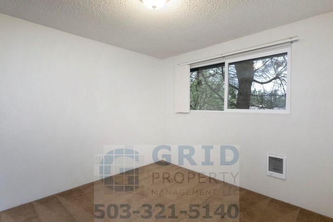 Building Photo - Two Story, Two Bedroom Apartment Available - Private Yard Space!