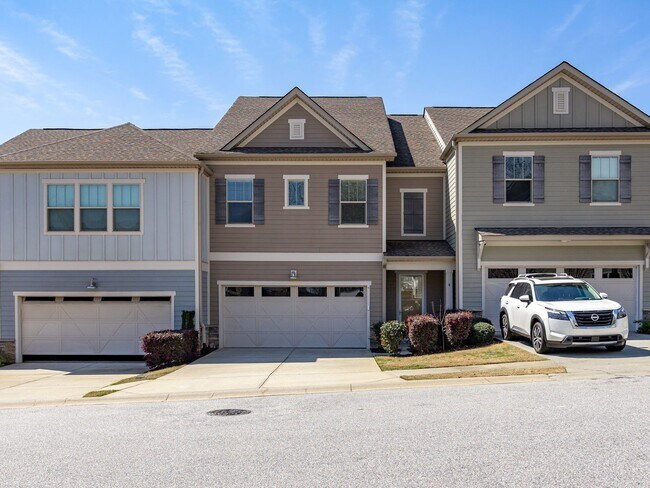 Building Photo - **MOVE IN SPECIAL! 50% off first month's rent!!** Spacious 4BR Townhouse with 2-Car Garage Near D...