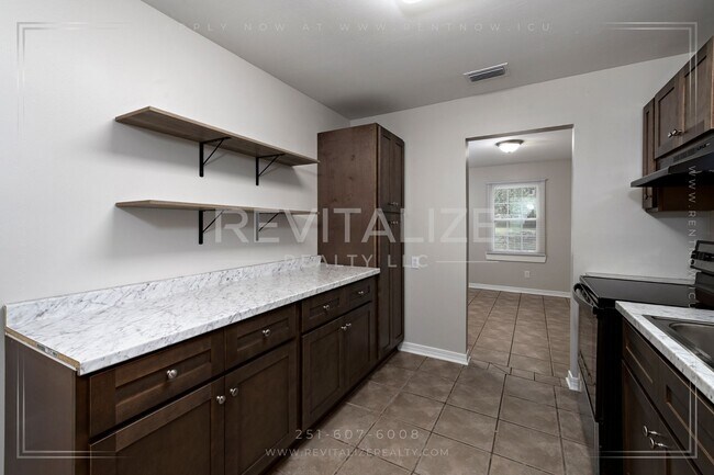 Building Photo - Cozy, Updated 3-Bedroom Home with a Shady Yard!