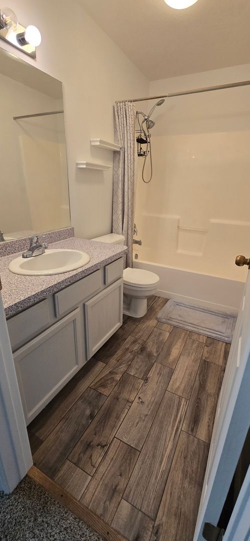 Building Photo - 8084 N Ridge Loop E