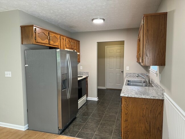 Galley kitchen/laundry room opening - 1965 Baggett Rd