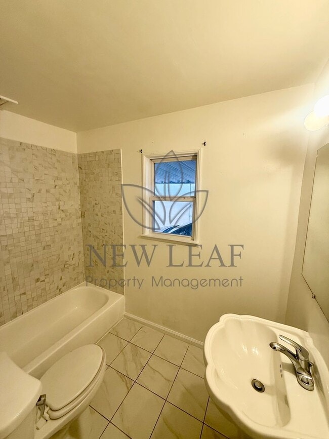 Building Photo - 1100 W 39th Pl