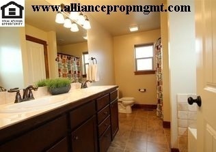 Building Photo - Centrally-located 3 bedroom home with paved RV parking.