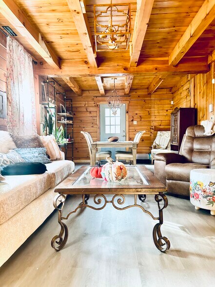 Lovelly living room and dining area with newly constructed laminate floors - 93 Shepard Ave