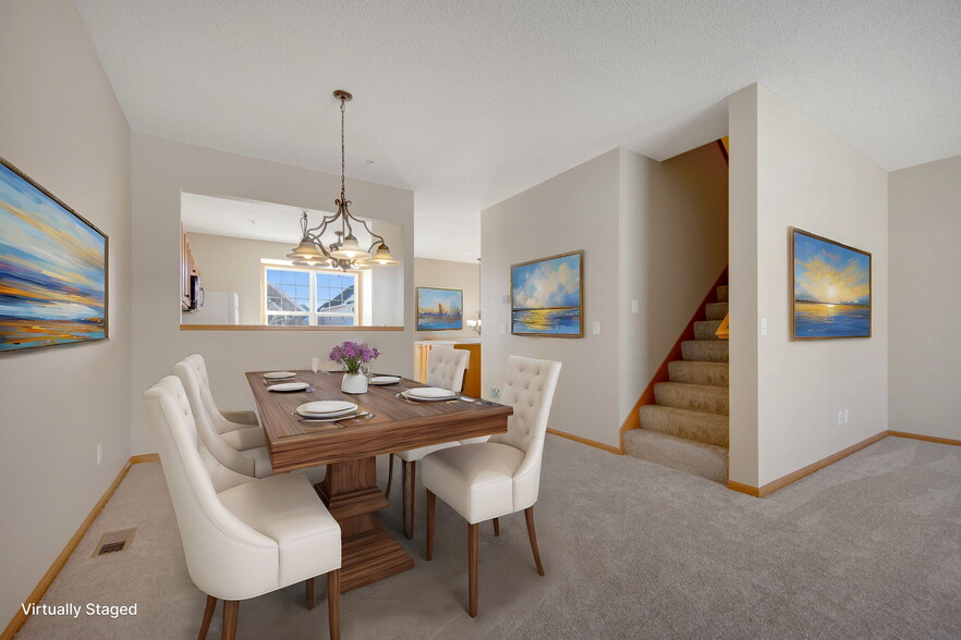 Dining Room with the Kitchen in the background - 10022 Gentian Dr