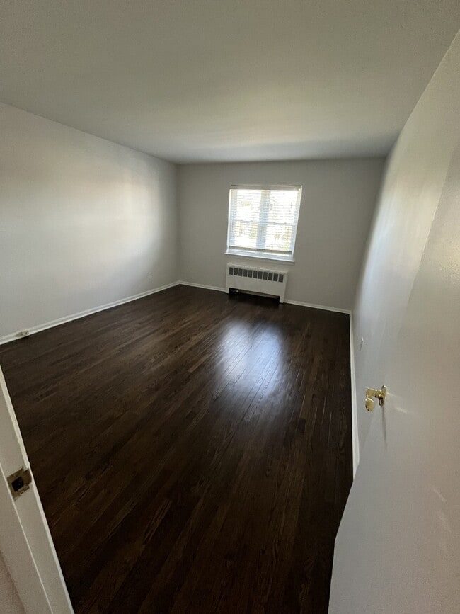 Building Photo - "Chic 1-Bedroom Condo Oasis with Granite Touches & Gleaming Hardwood Floors in Verona!"